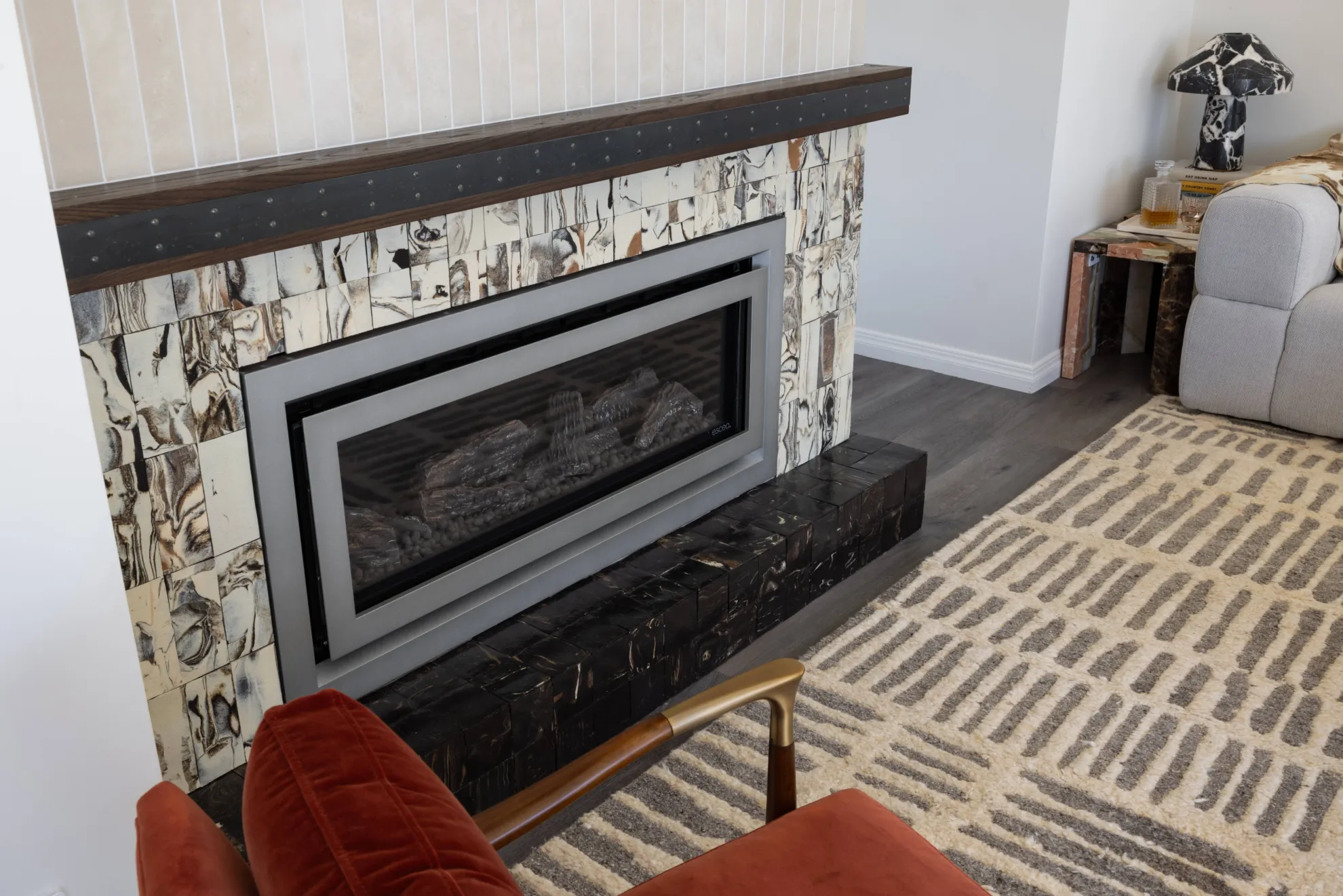 Bespoke fireplace design ideas creating a warm and elegant focal point in a New Zealand living room interior